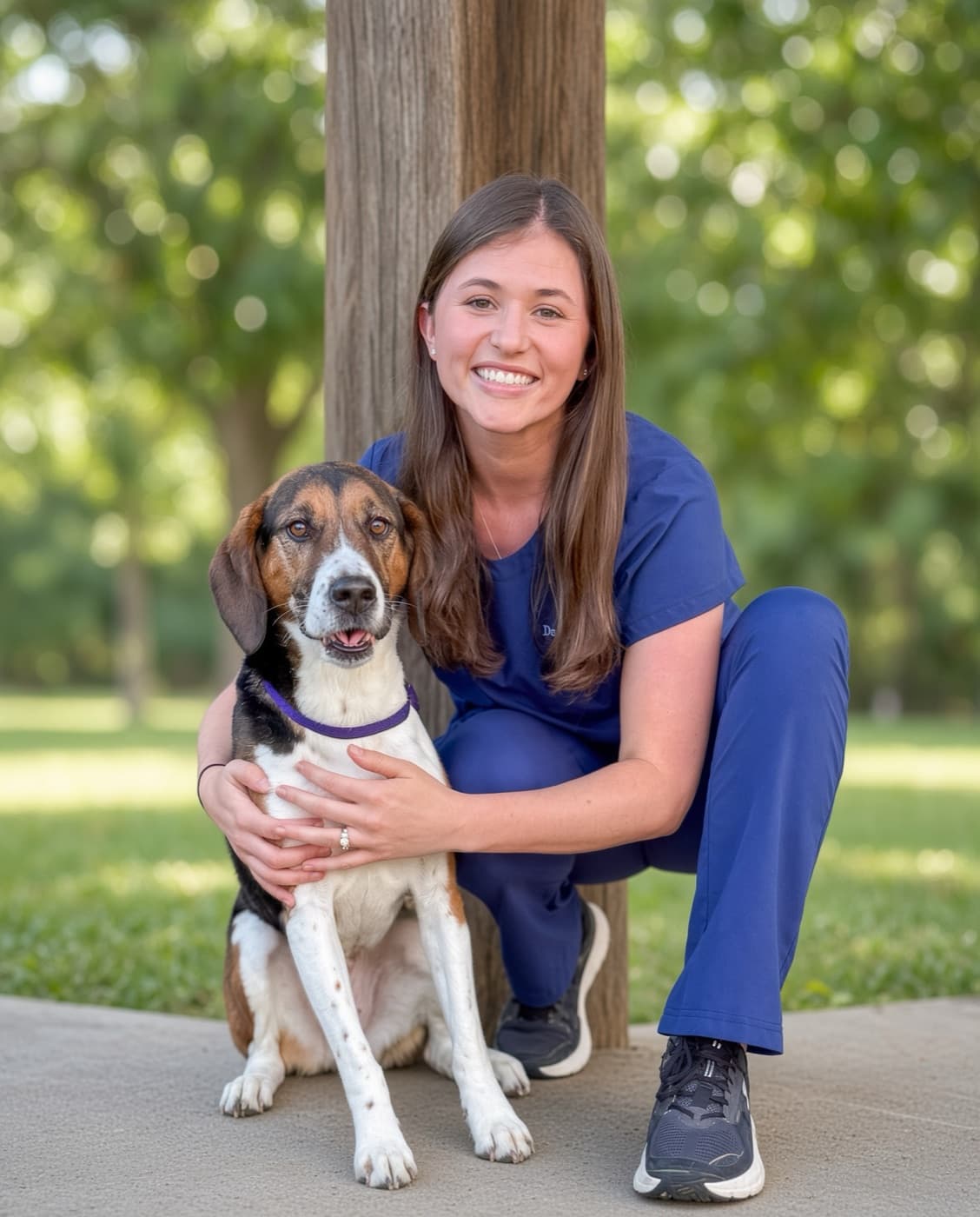 Dr. Cari Bell with a dog