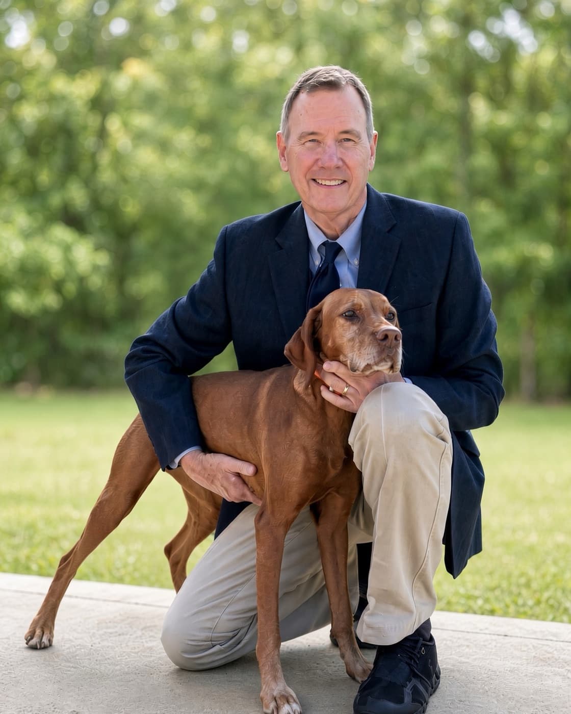 Dr. David T. Fuller III, Hope's board-certified reproduction vet, with his dog